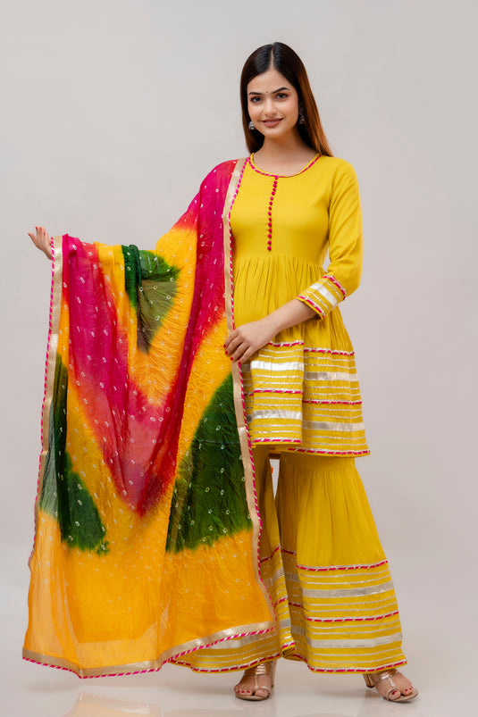 Women's Solid Viscose Rayon (LIVA) Potli Button BUTTER YELLOW Sharara Set with Gota Patti Work Trouser & Dupatta